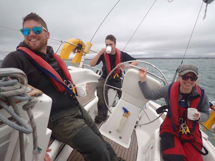3 happy crew on an RYA Day Skipper sailing course.