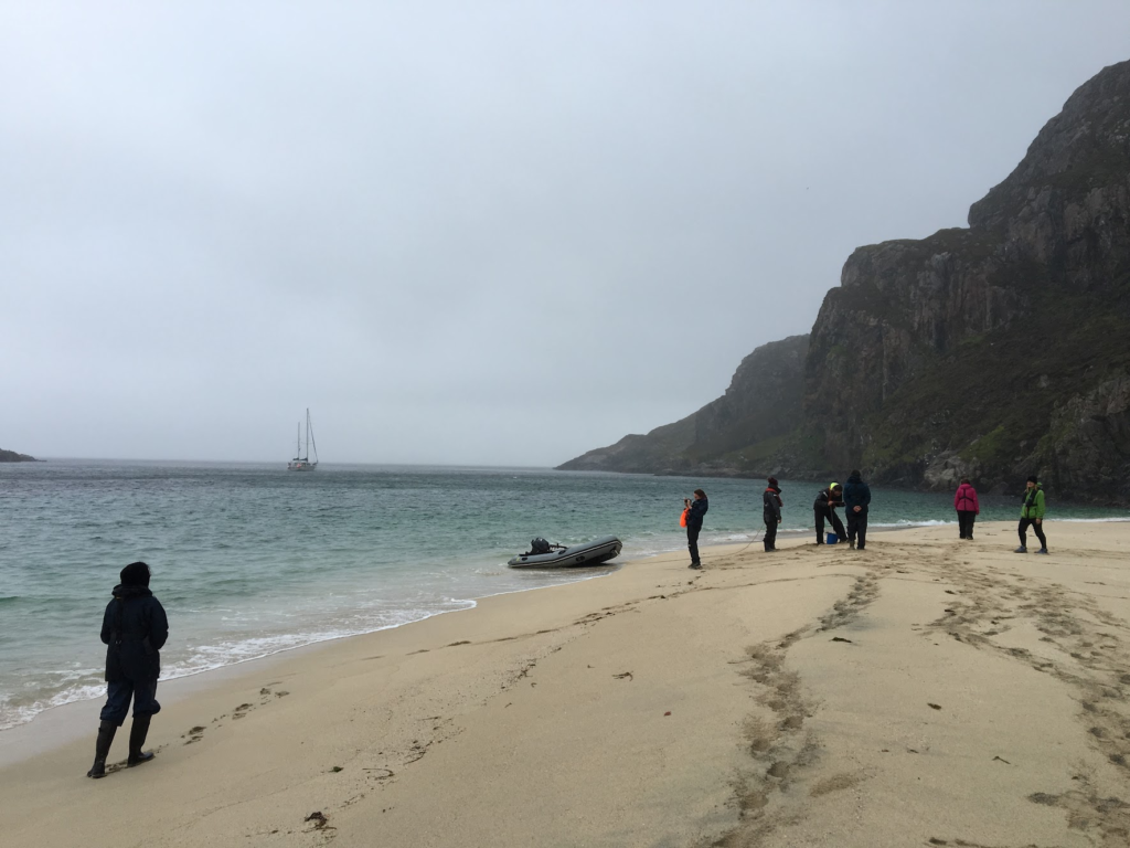 Anchoring and visiting remote islands requires appropriate clothing and footwear. These new day skippers needed wellies to get onto this remote beach without getting wet feet.