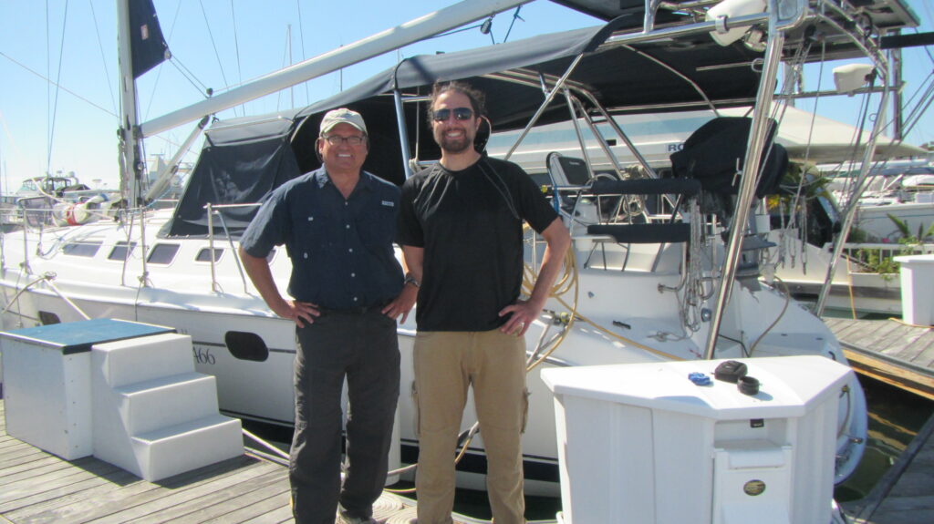 Put on a smile. These two are certainly looking happy whilst viewing this boat.